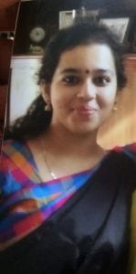 Headshot of Swetha Sridhar in a colorful sari